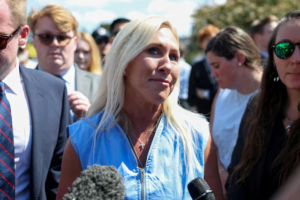 lawmaker Marjorie Taylor Greene accuses Trump of threatening her